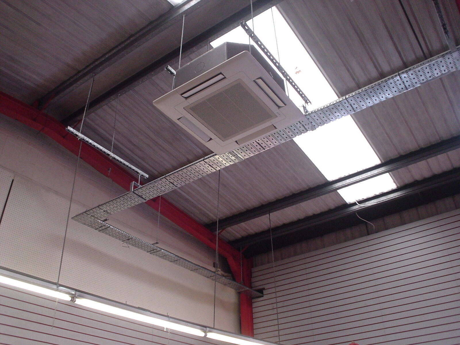 Ceiling cassette installed in a commercial unit